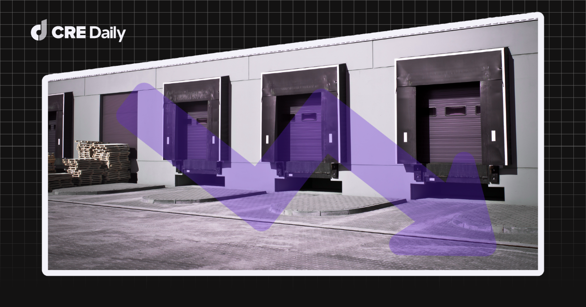 Warehouse loading docks with closed doors and stacked pallets; a large purple downward arrow suggests a decline.