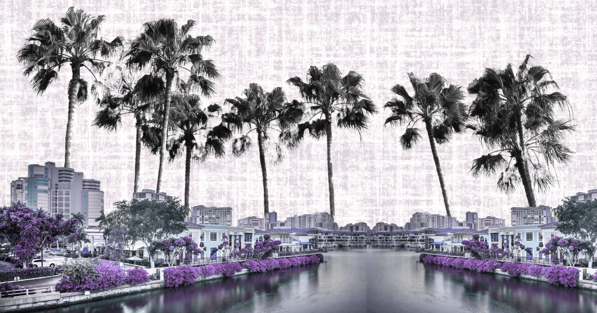 Surreal scene: tall palm trees along a canal, with purple-tinted buildings and sky. Featured on a real estate site article.