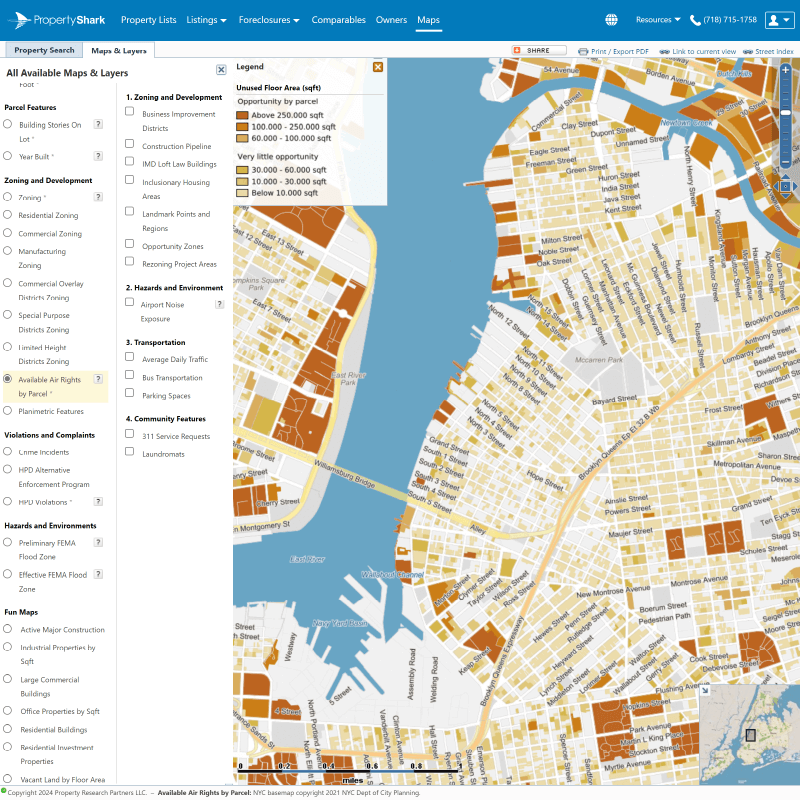 A detailed map shows zoning, development areas, color-coded regions, a river with bridges, and a legend for categories and landmarks.