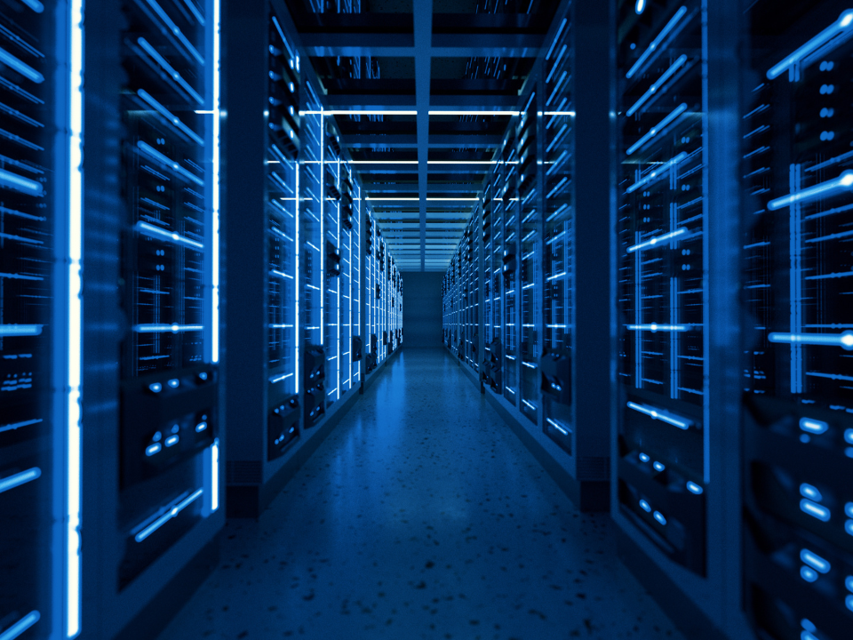 Futuristic data center hallway with glowing blue server racks, conveying depth and symmetry, featured in a Digital Realty article.