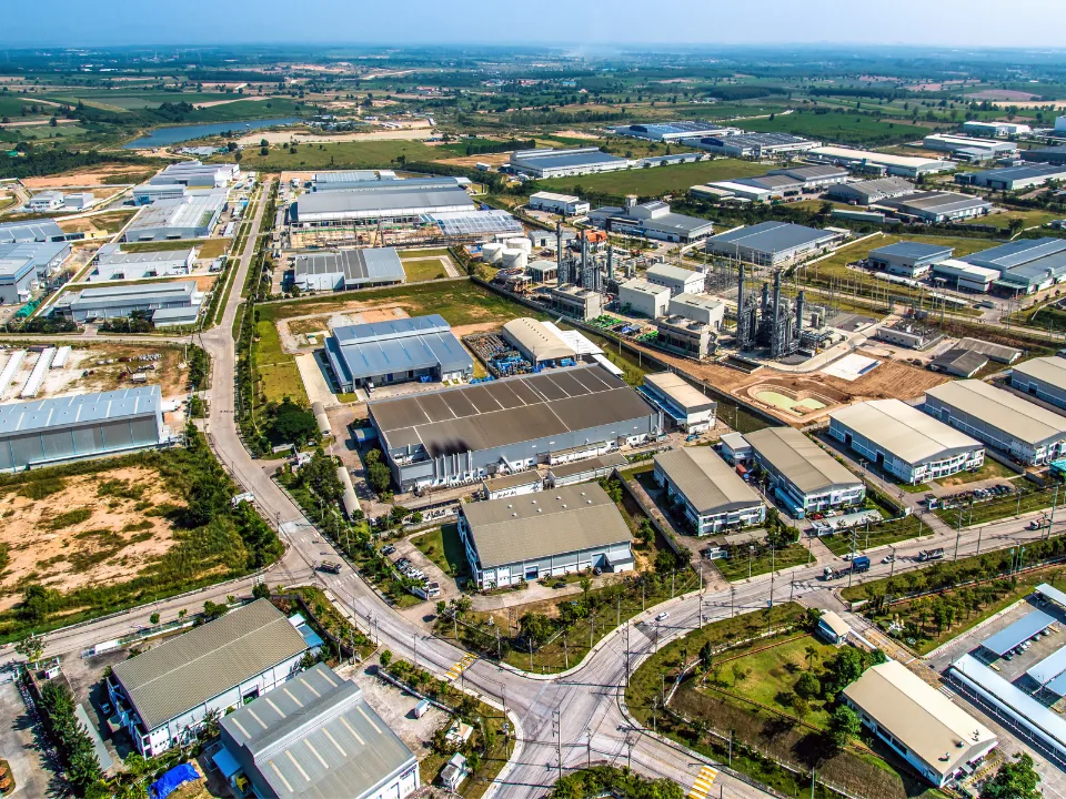 Tariff uncertainty stalls industrial real estate growth as developers pause leasing and construction amid shifting trade policies.