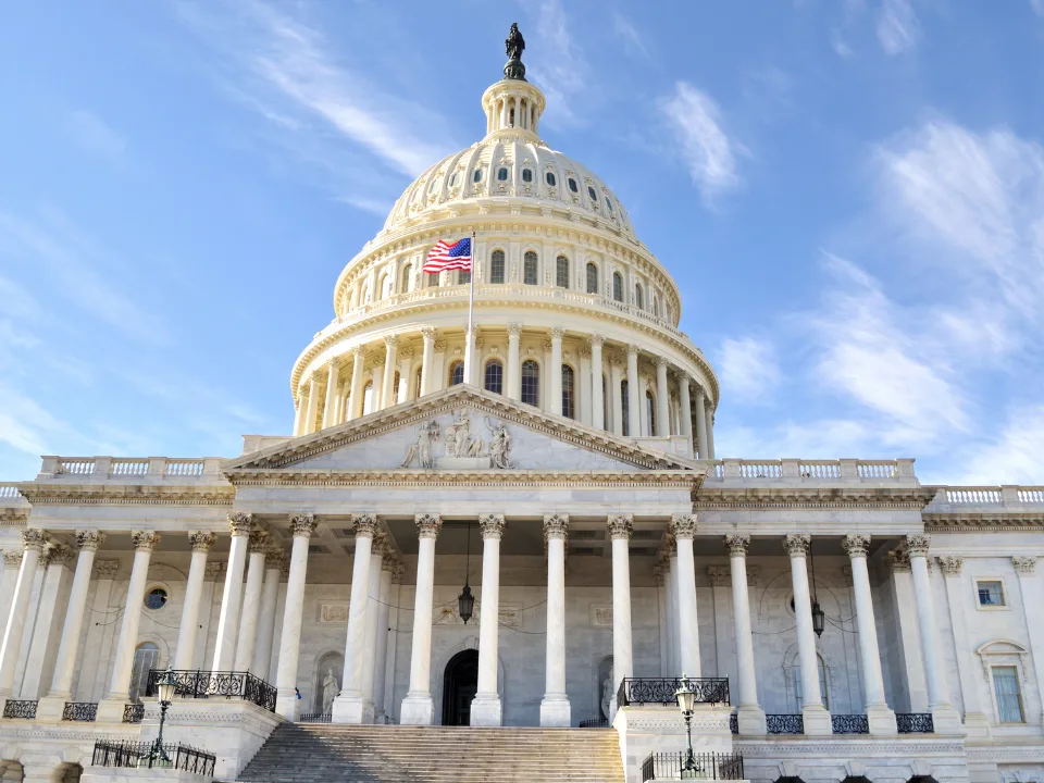 Carried interest stays untouched in the House tax bill, but Senate talks could revive the issue in final legislation