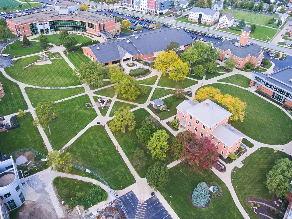 College towns face economic strain as declining enrollment impacts universities, local businesses, and housing markets.