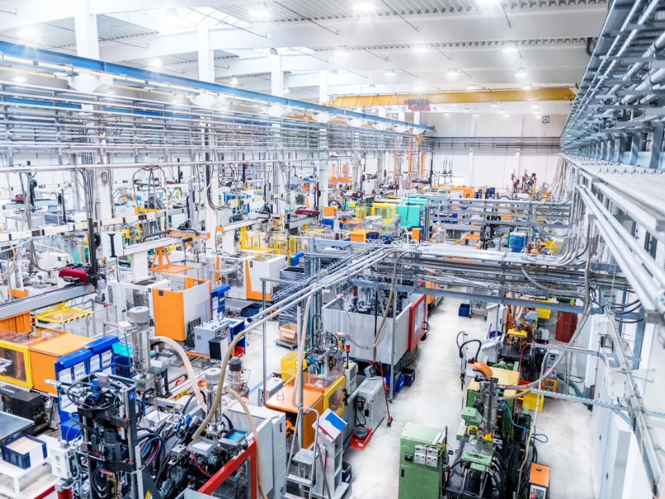 Manufacturing revenue stalls in 2025 as tariffs and costs rise, despite major US expansion plans from top firms like Apple and Ford.