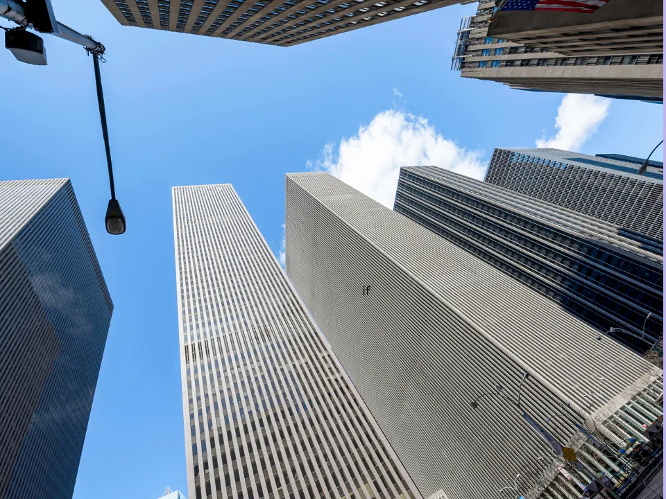 SL Green puts prime Manhattan buildings on the market amid growing investor interest and a strengthening NYC office sector.