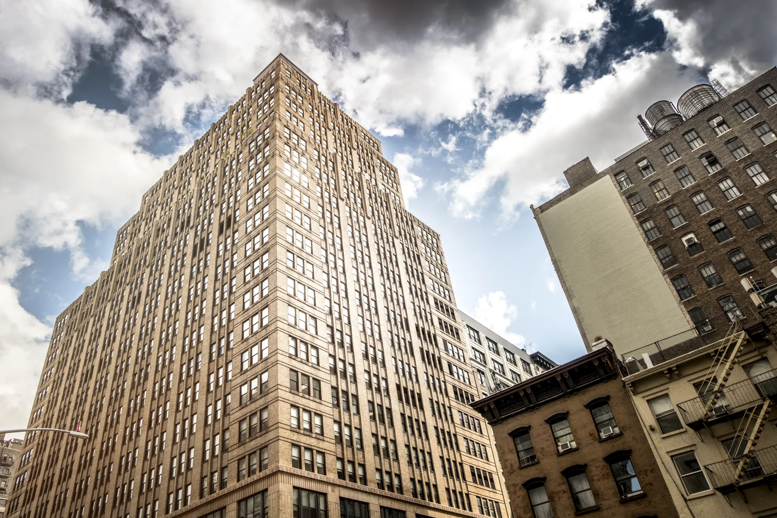 Temporary relief keeps NYC bankrupt apartments operational as court approves short-term funding amid landlord-lender dispute.