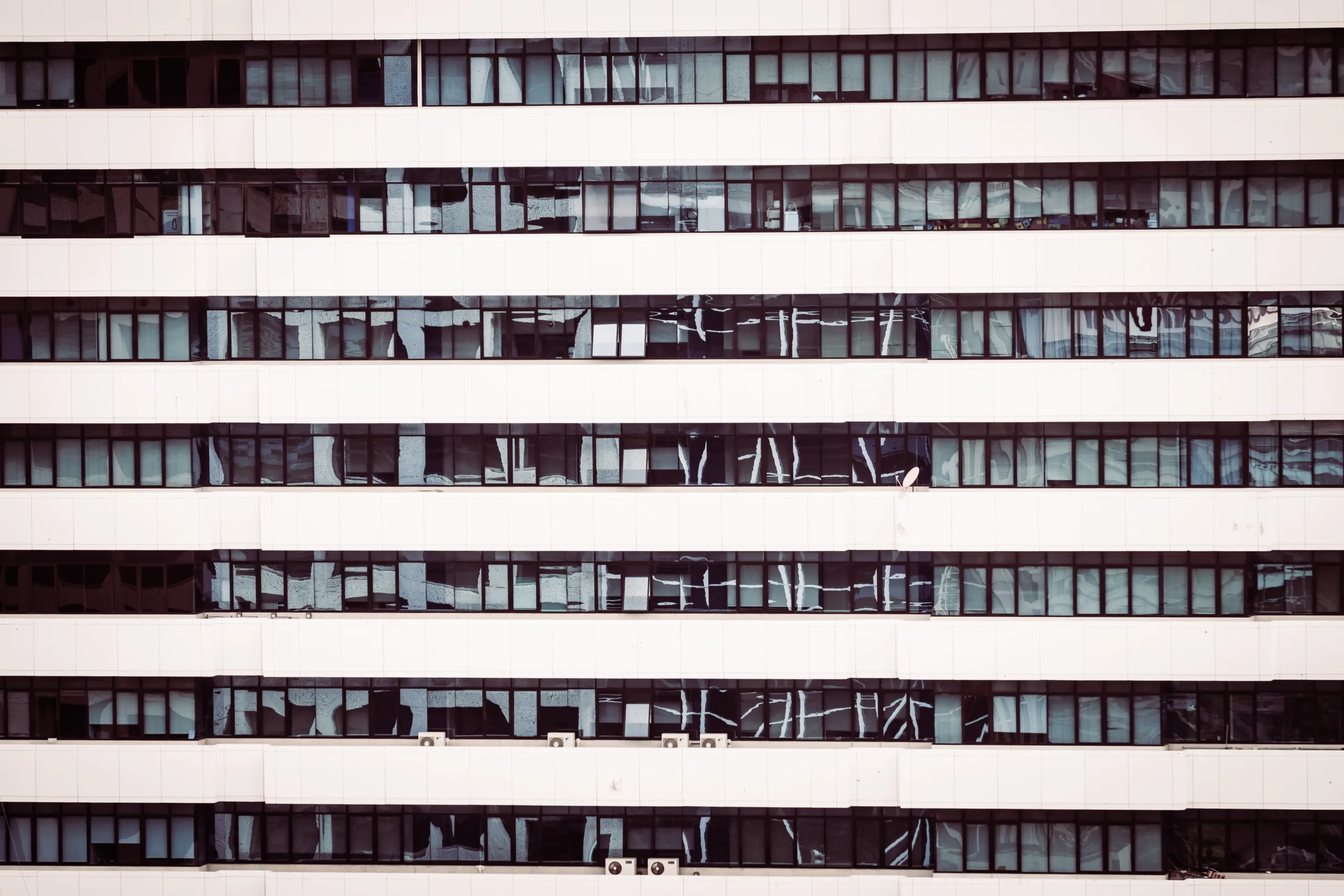 Banks are offloading distressed debt as private credit funds step in to seize CRE opportunities at discounted prices.