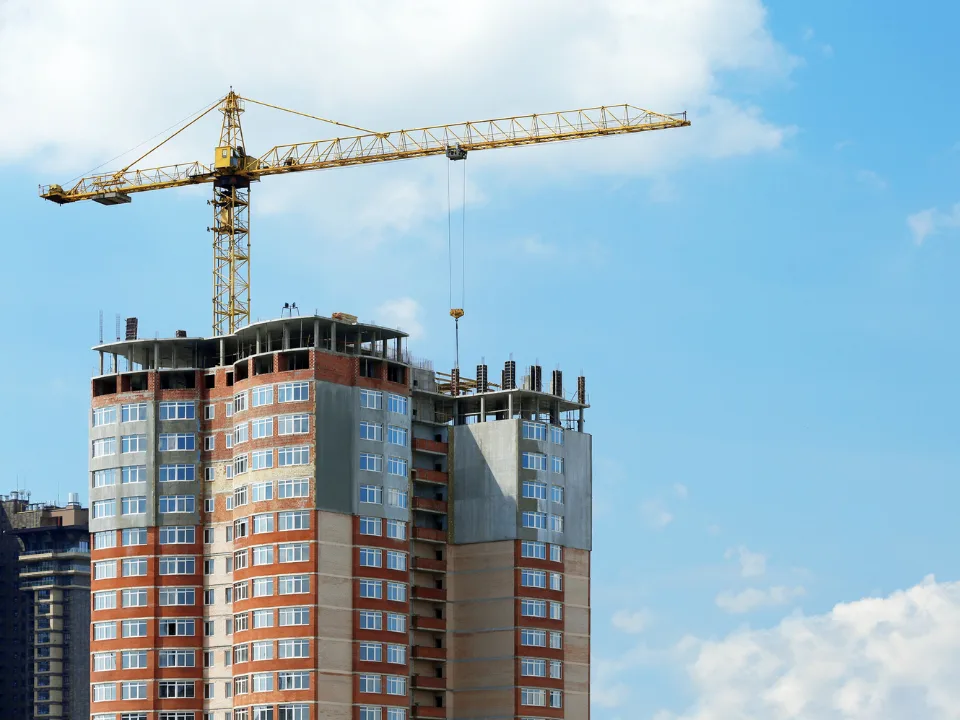 The multifamily forecast rises as Yardi Matrix projects stronger completions through 2027 despite a smaller construction pipeline.