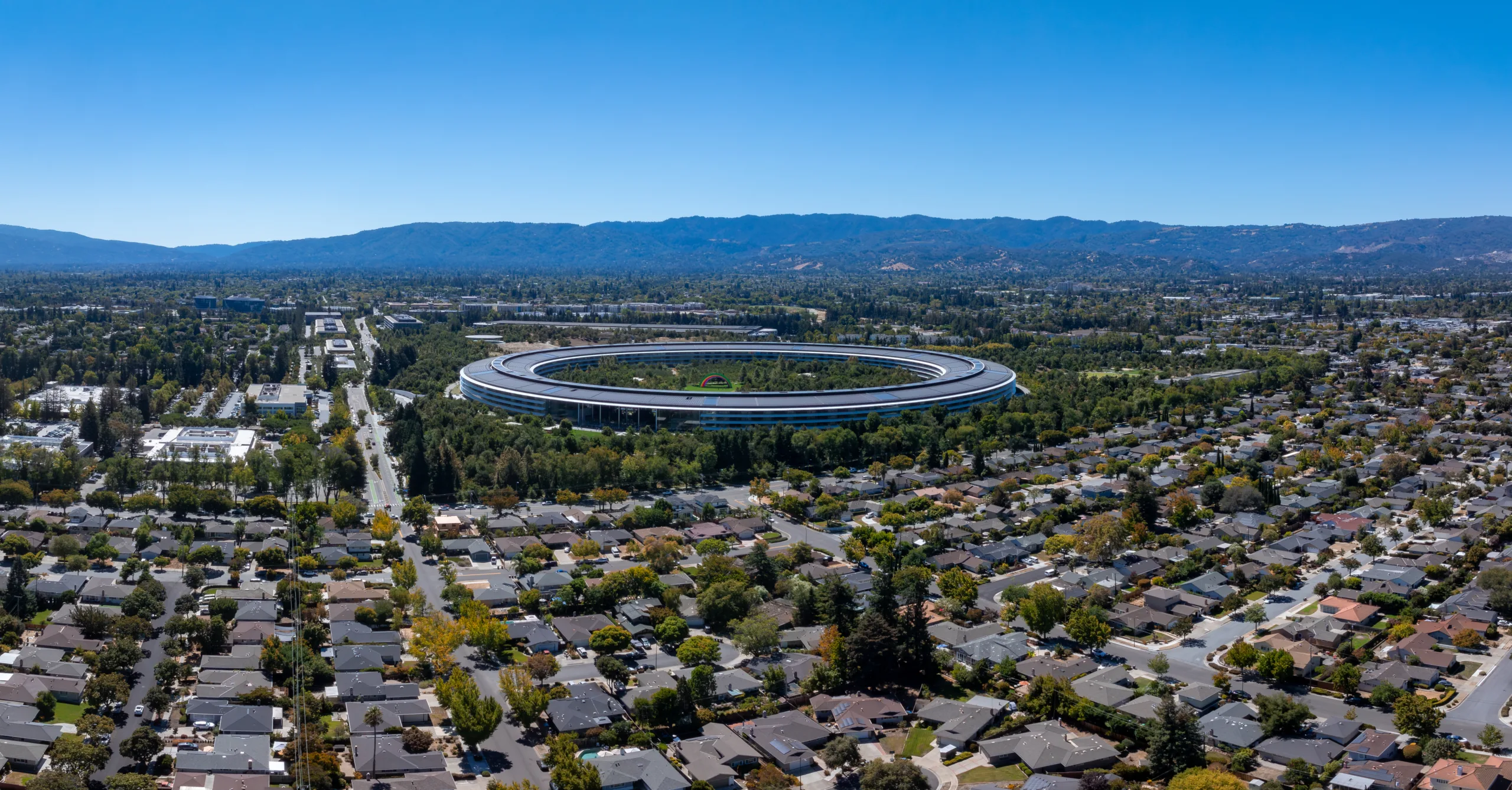 Nvidia forecasts $4T in global AI infrastructure spend by 2030 while expanding US real estate to support demand.