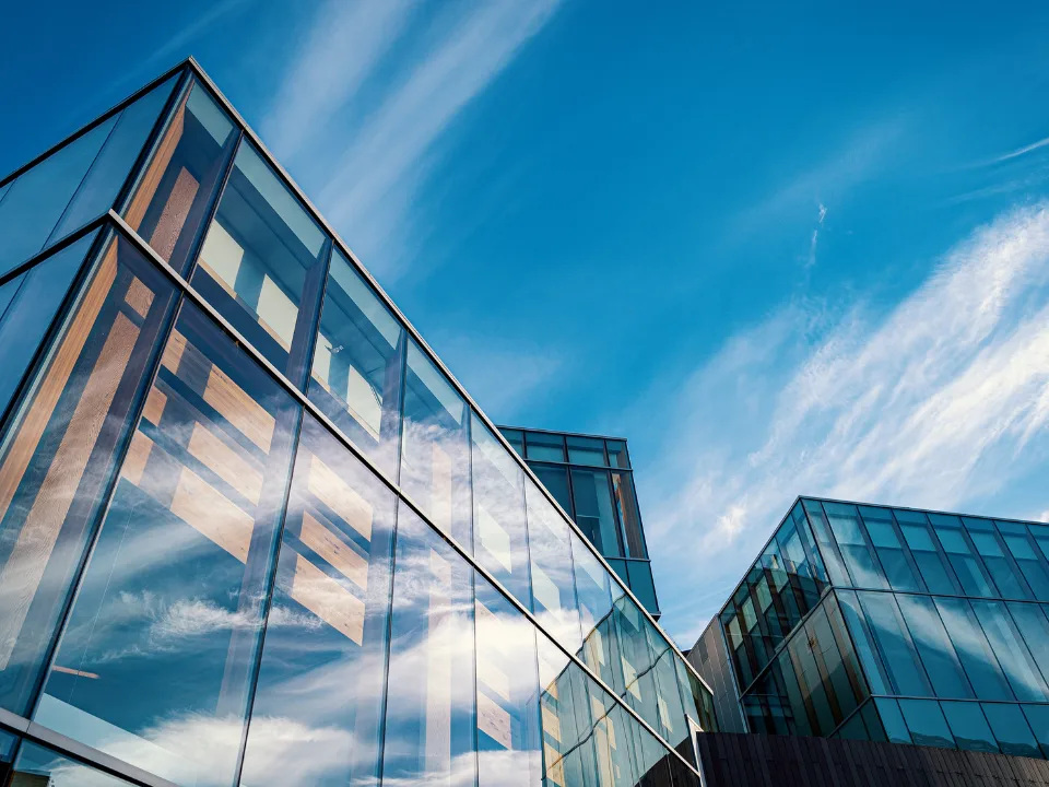 The peak in commercial real estate debt is nearing, but signs point to a more manageable refinancing cycle.