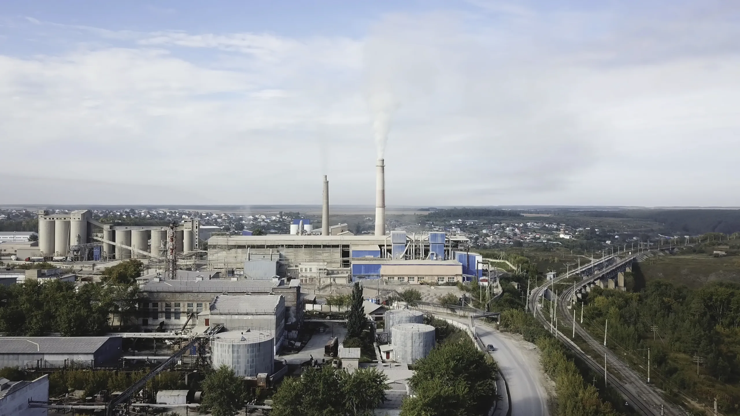 Rivian plant breaks ground in Georgia as EV demand cools and political uncertainty clouds the future of tax incentives.
