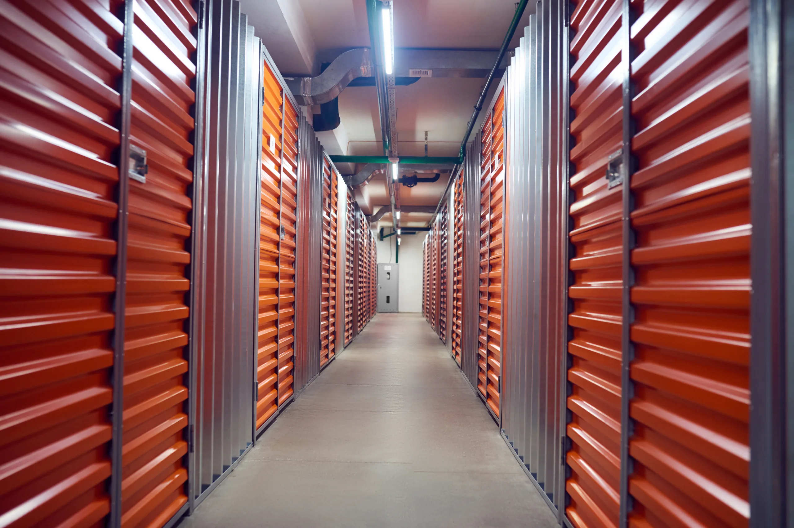 Self-storage sector stabilizes in 2025 as supply slows, but recovery depends on rate cuts and market absorption.