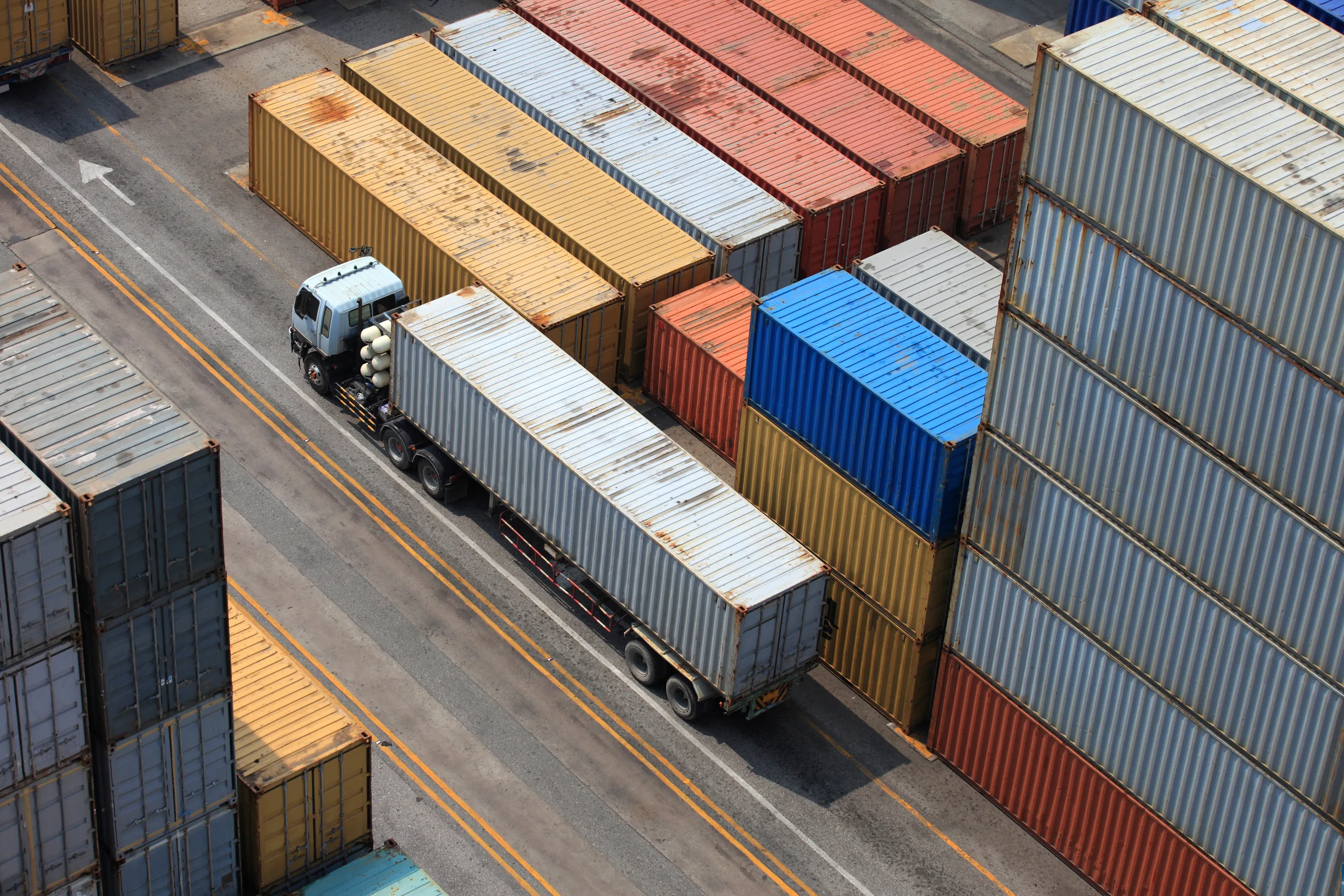 Container pricing is falling sharply, indicating a potential decline in West Coast port import demand through late 2025.