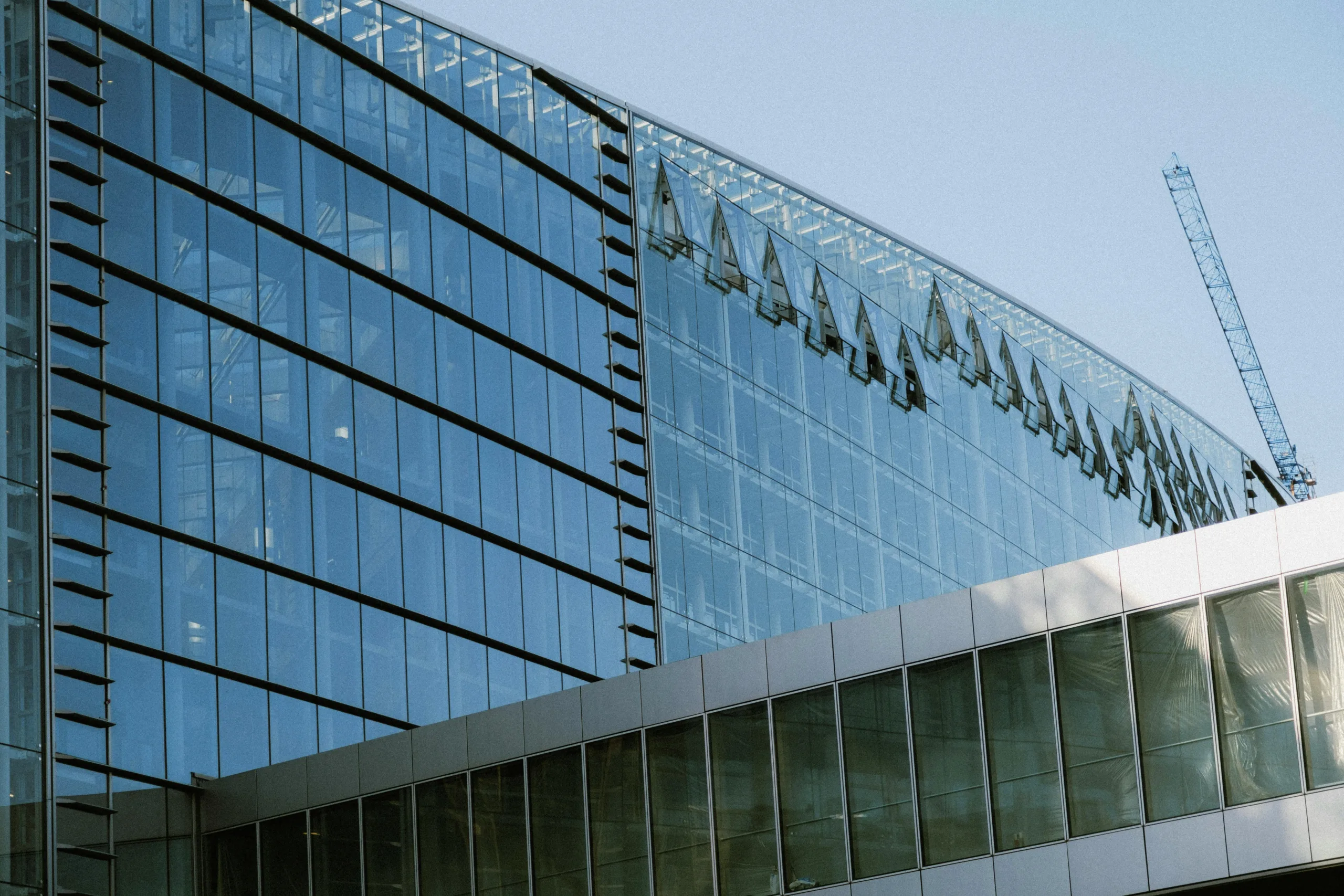 Apollo and BlackRock grow real estate assets by $57B with acquisitions of Bridge Investment Group and ElmTree Funds.