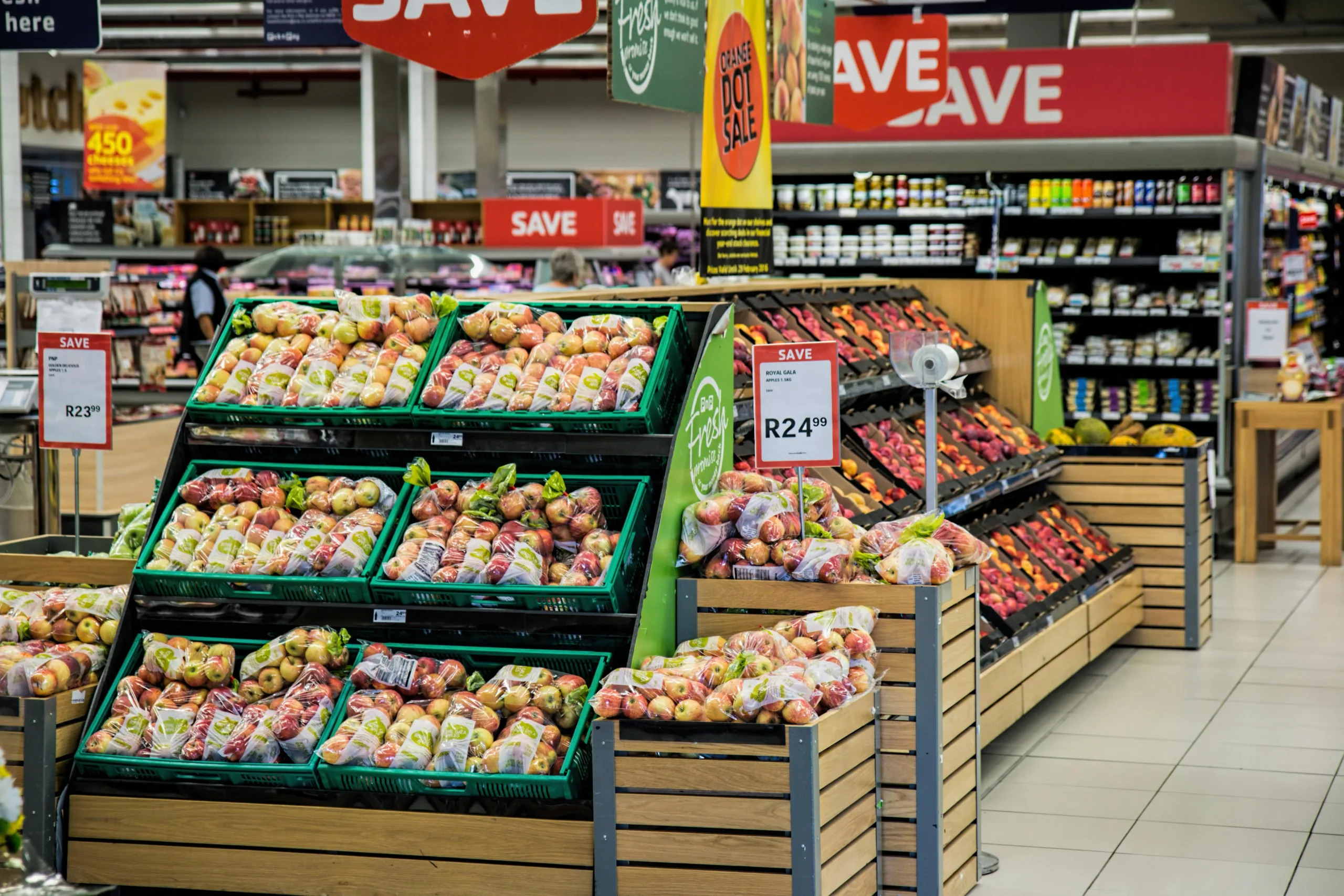 City groceries plan by NYC mayoral front-runner sparks fierce debate over food access, affordability, and private competition.