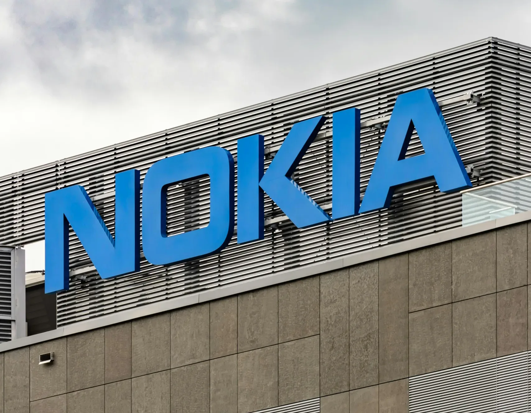 Nokia invests $4B in US manufacturing to boost AI and connectivity, expanding research, production, and strategic partnerships.