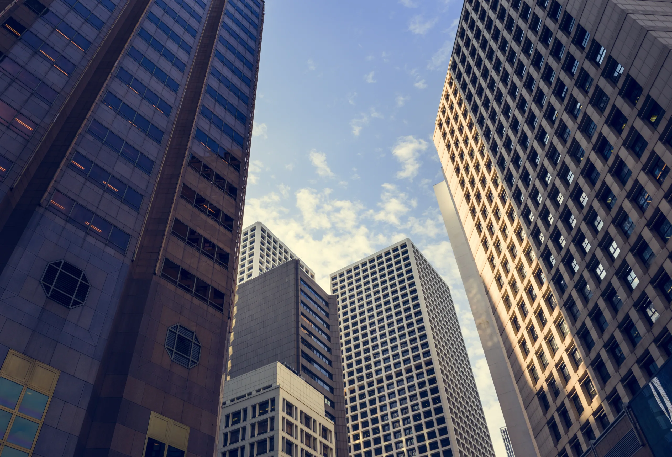 Manhattan office market sees rising rents and tight availability, despite a slowdown in November leasing activity.