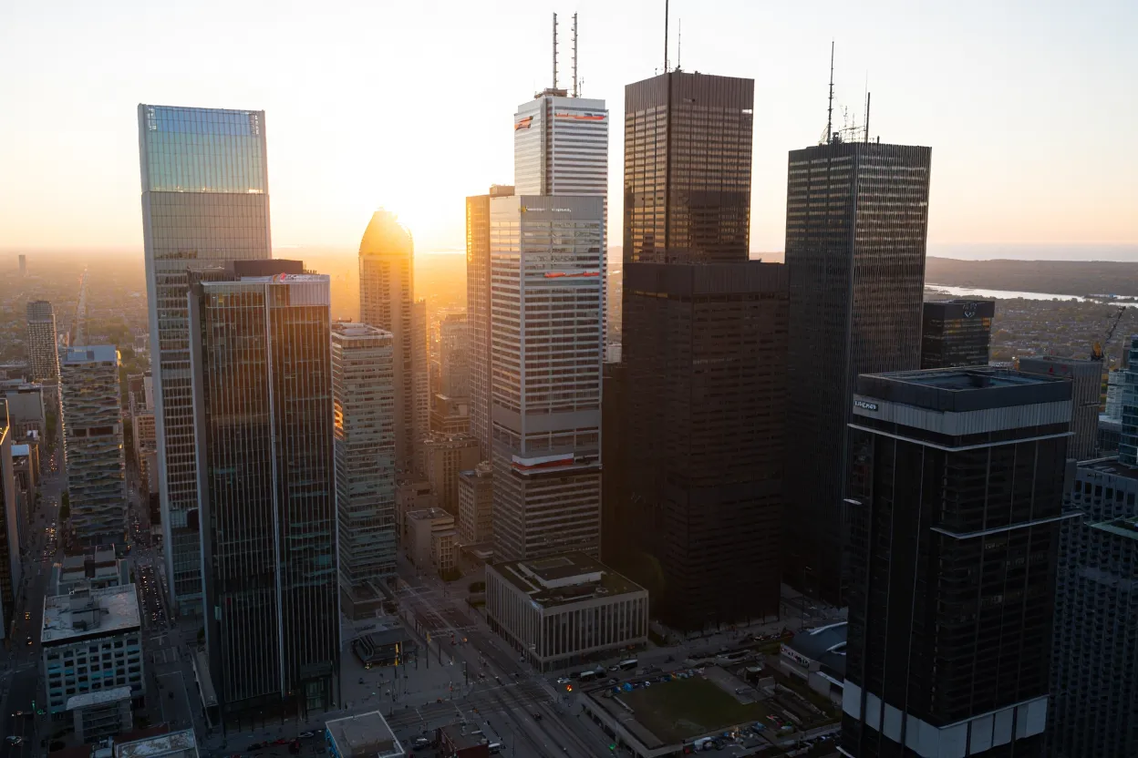 Colliers and Marcus & Millichap raise outlooks as deals rebound, reflecting CRE transaction growth and positive momentum heading into 2026.