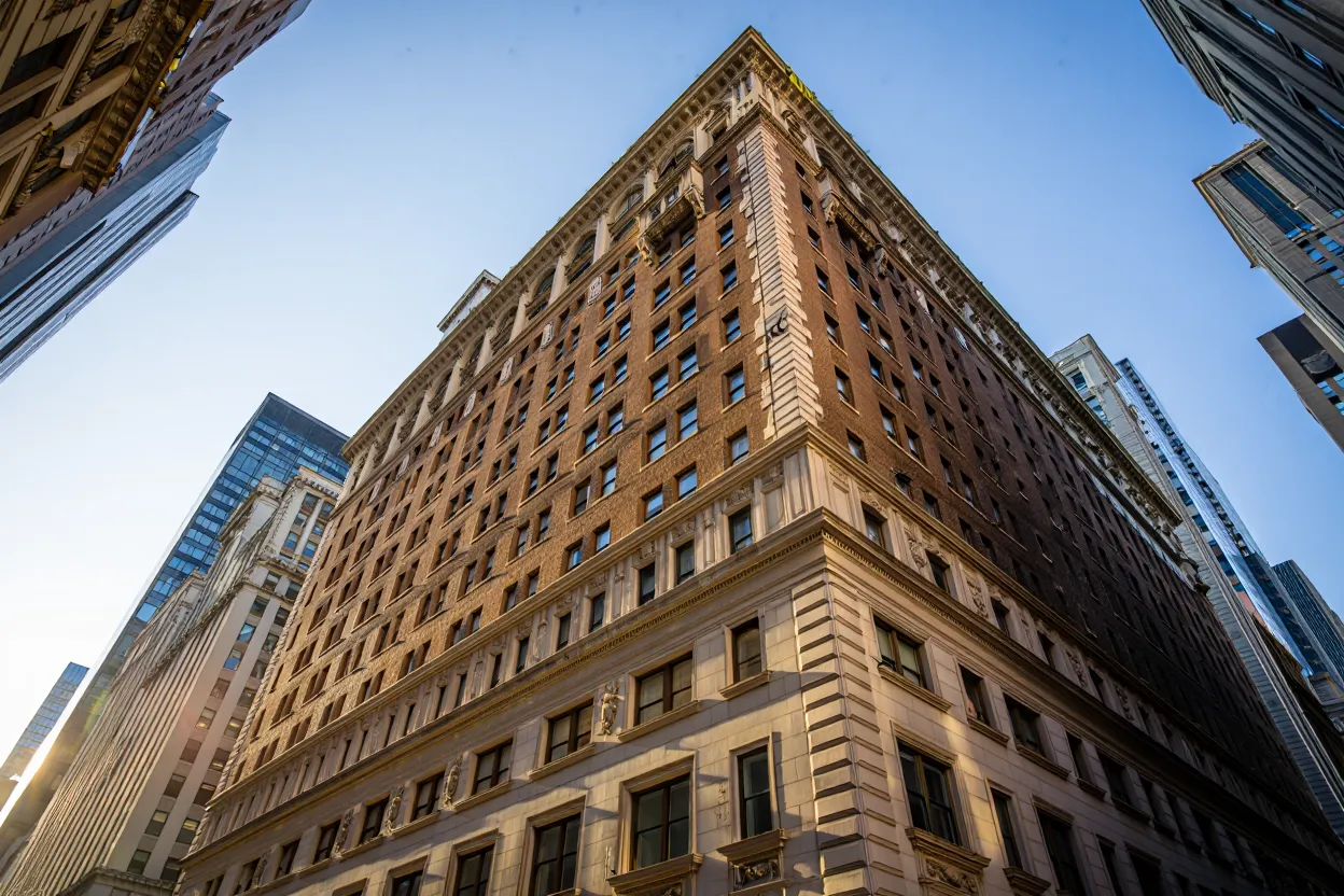 RXR and One Investment land $500M to convert 61 Broadway into 796 apartments, boosting Manhattan’s office-to-residential push.