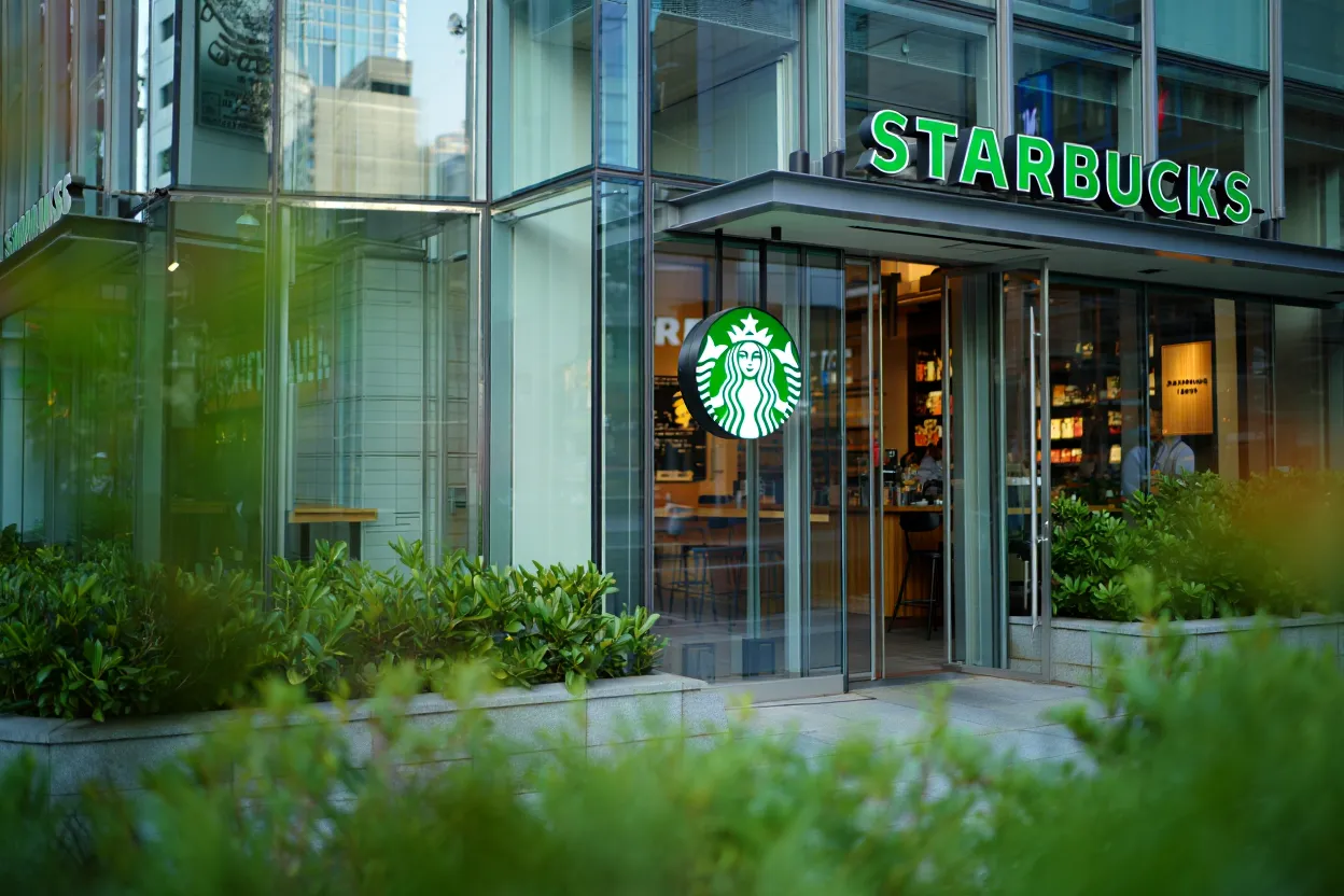 Store expansion drives Starbucks to raise its 2026 outlook as the chain plans 650 new cafes and upgrades across US and global markets.