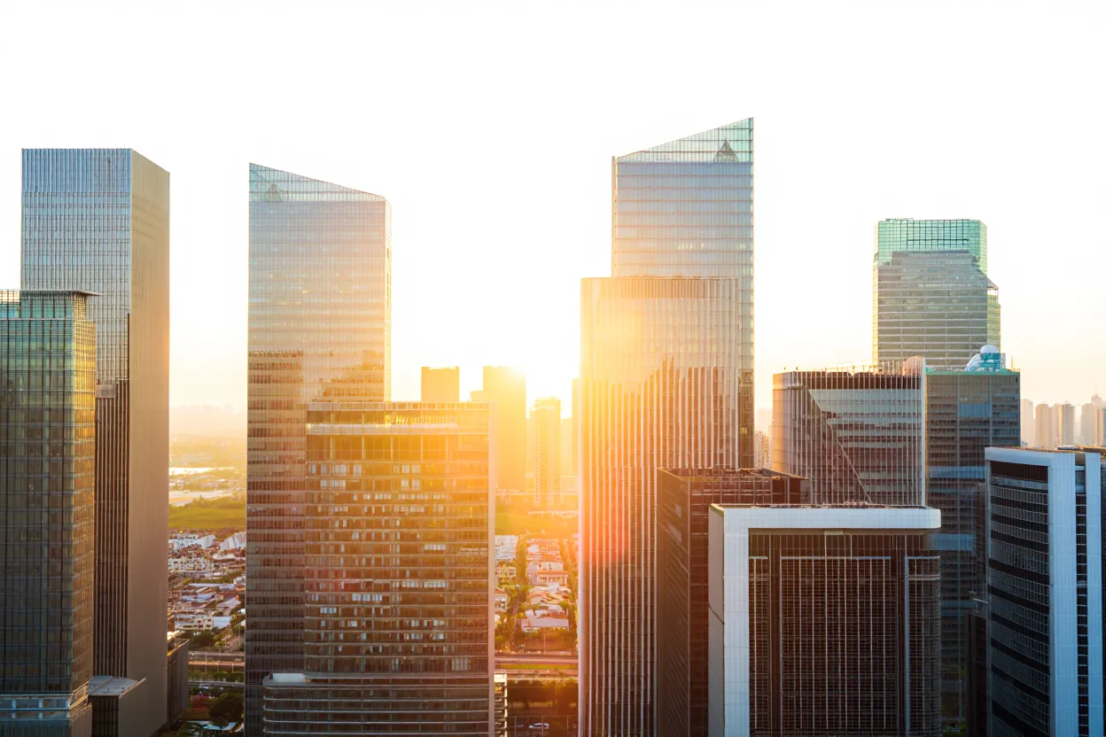 Brokerage boom drives record revenue for JLL, Newmark, and CBRE, signaling a strong post-pandemic recovery in property dealmaking.
