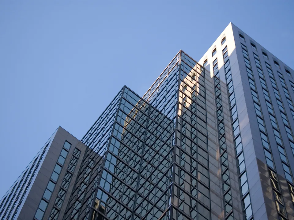US office vacancy declined for a second straight quarter as office leasing improved and conversions reduced supply across major markets.