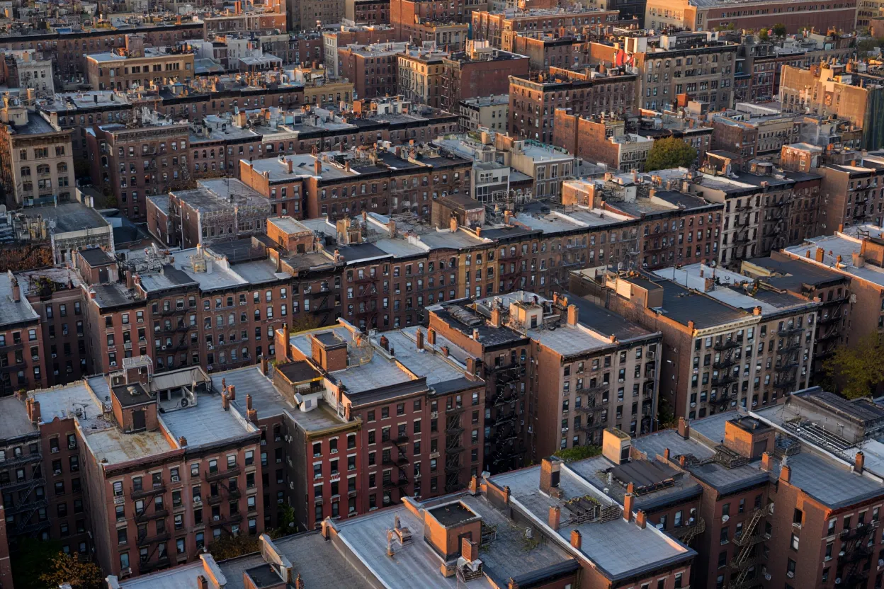 NYC rent freeze raises CMBS risk as Fitch warns of rising defaults among pre-1974 rent-stabilized properties.