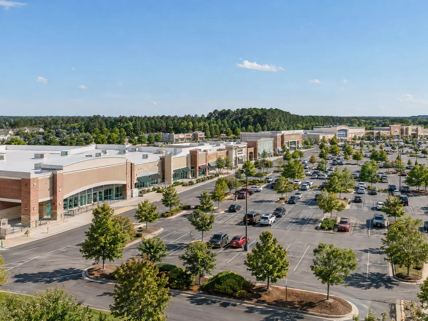 Invesco REIT bought a fully leased Raleigh retail center for $87.2M as fundraising accelerated and portfolio leverage edged lower.
